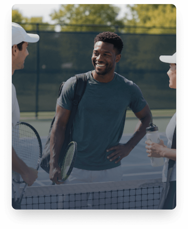 Tennis players meeting at the net